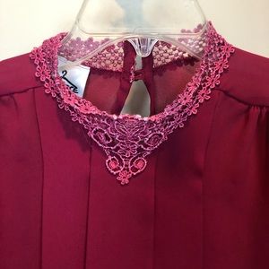 Beautiful womens red top with lace neckline